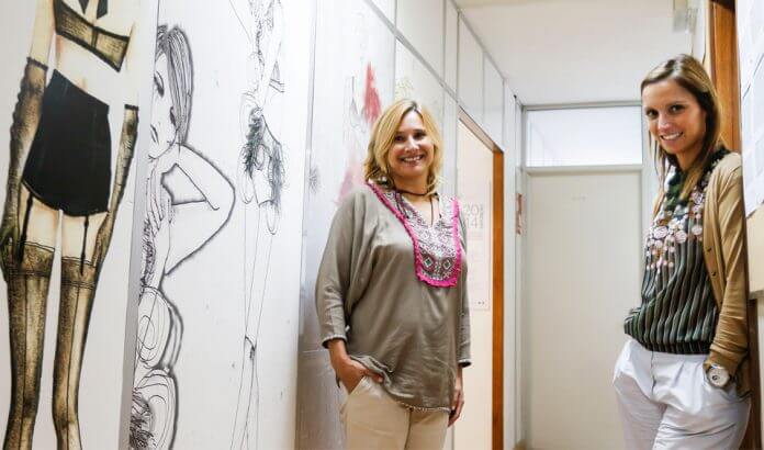 Gudi two teachers on the school corridor